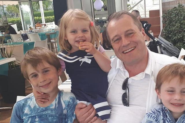 Conor McGinley, 9, Darragh McGinley, 7, and Carla McGinley, 3, with their father Andrew McGinley