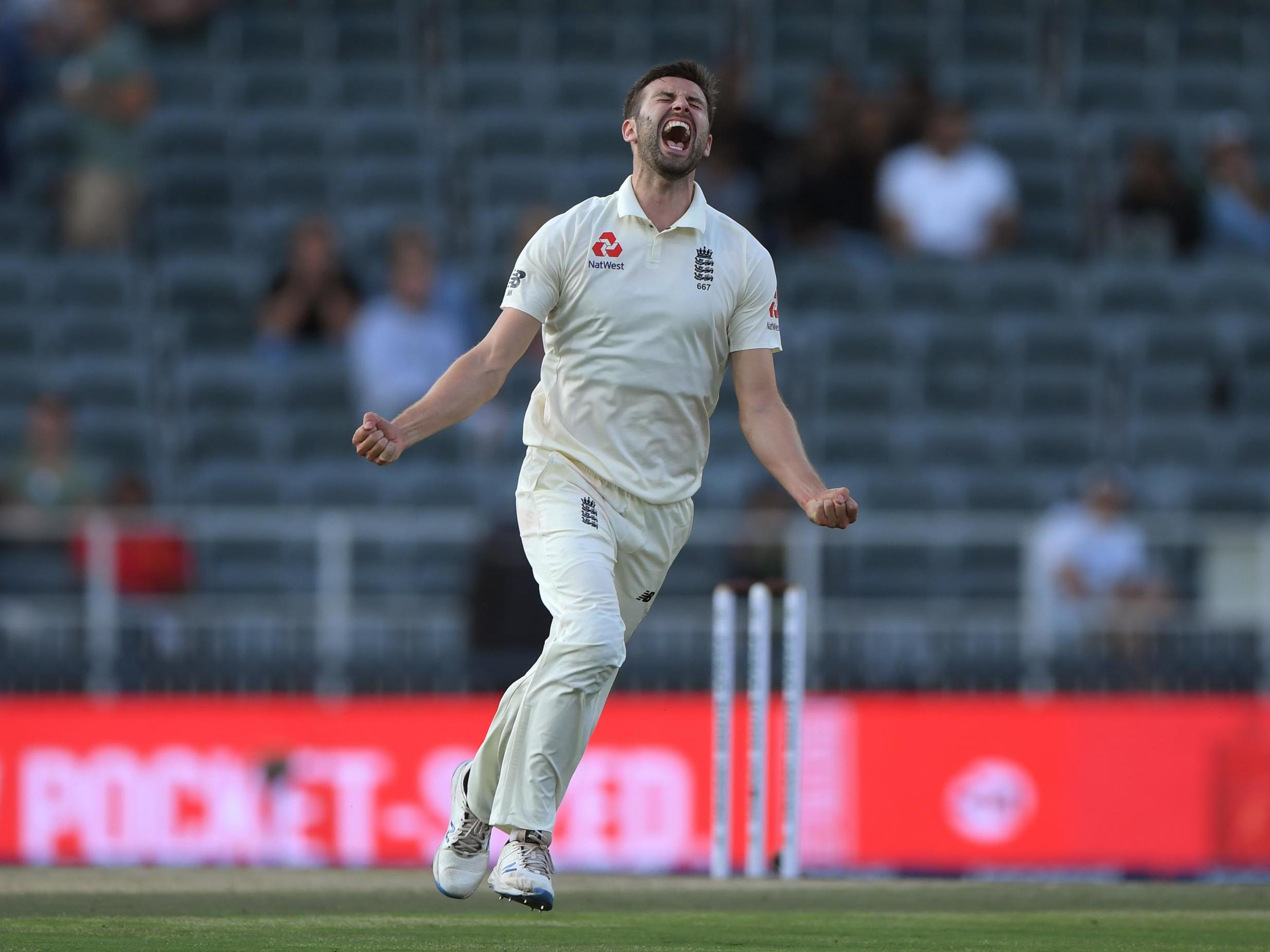 Mark Wood celebrates after dismissing Anrich Nortje
