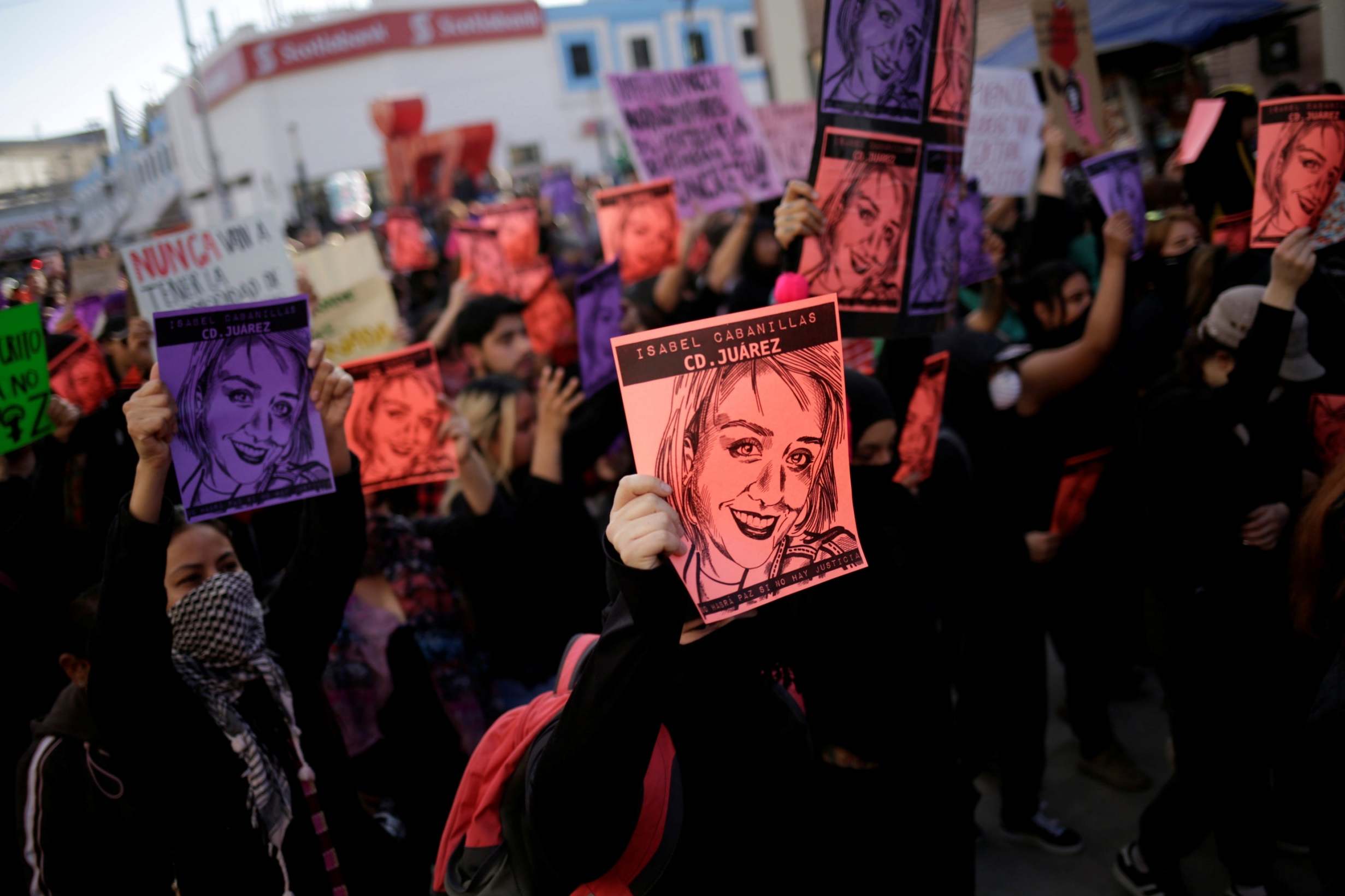 Protesters take to the streets to demand justice for the murder of Isabel Cabanillas (Reuters)