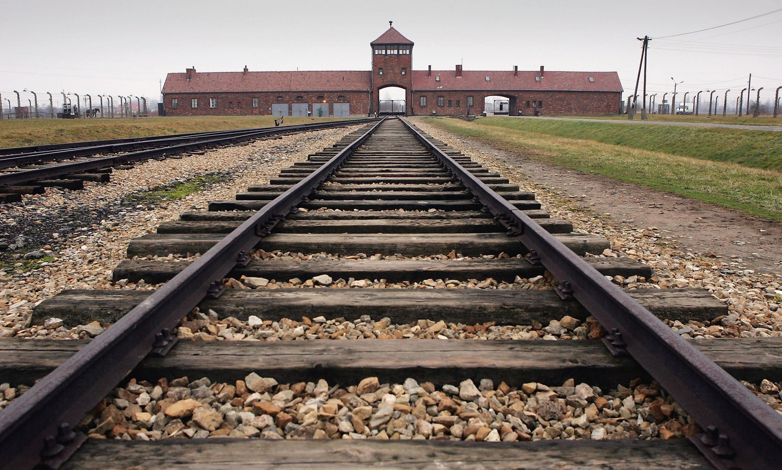 The railway tracks leading to the main gates at Auschwitz II Birkenau seen in colour December 10 2004 (Scott Barbour/Getty Images)