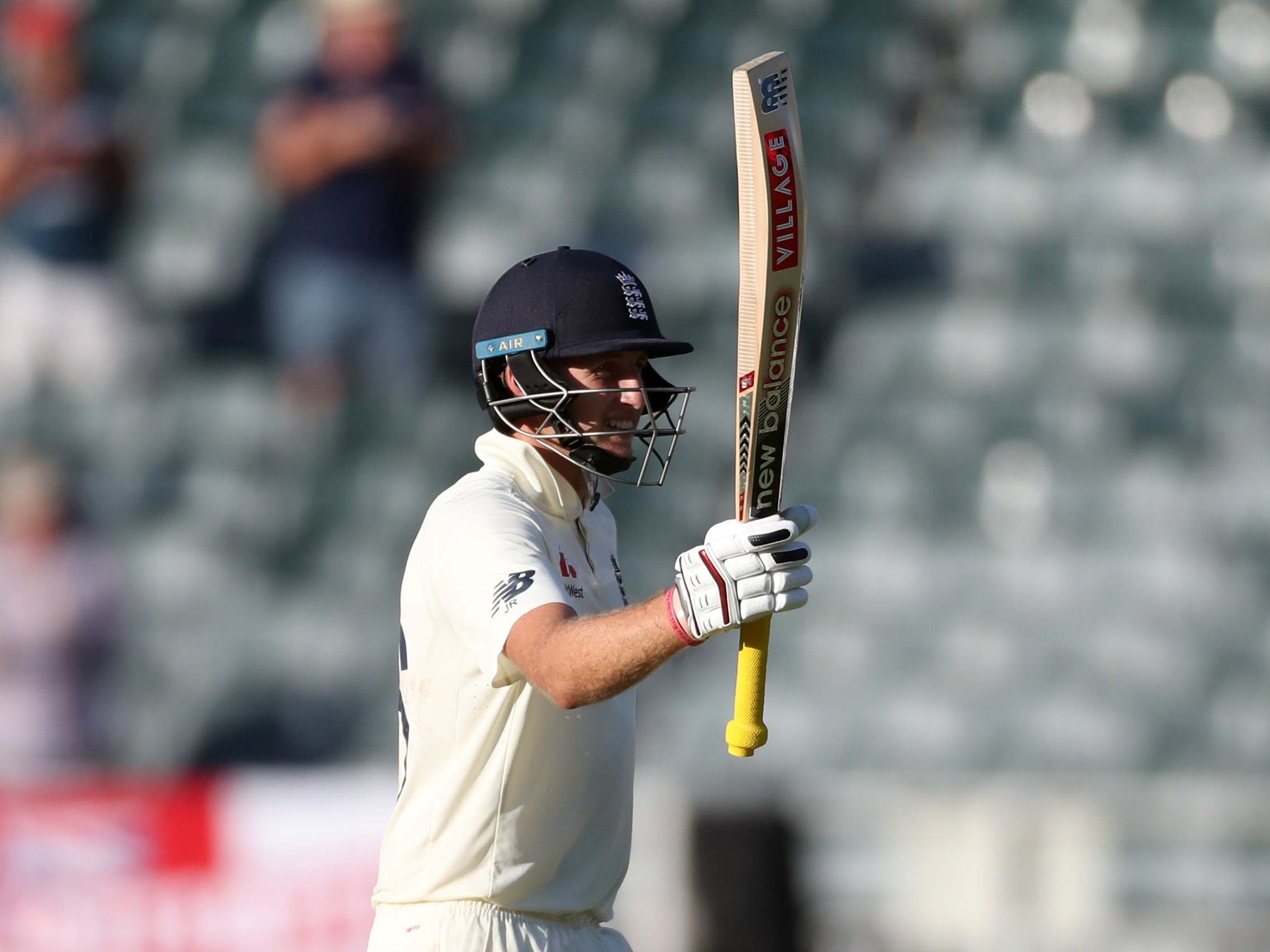 Joe Root celebrates his half-century in England's second innings