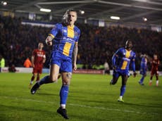 Cummings strikes twice to earn Shrews FA Cup replay at Liverpool