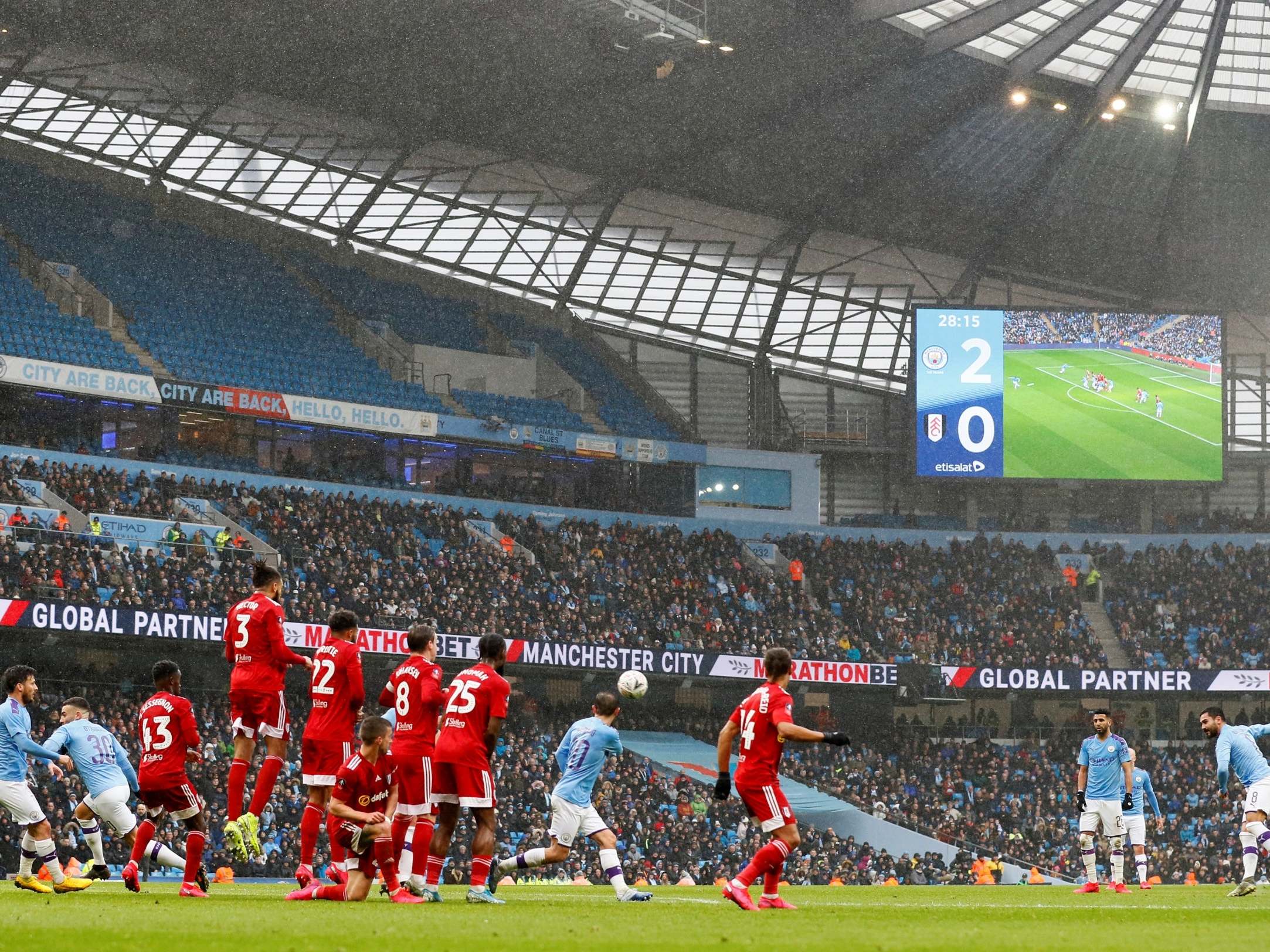 Manchester City beat Fulham in front of many empty seats at the Etihad
