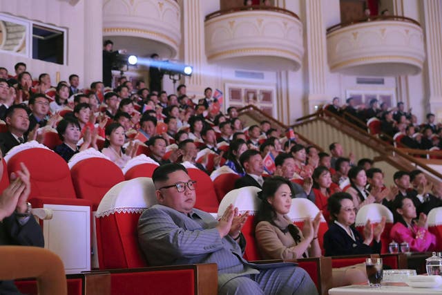North Korean leader Kim Jong-un (centre) is shown sitting close to his aunt Kim Kyong-hui (second from right) on official state media pictures