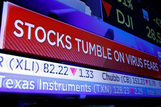 A television screen headlines trading on the floor of the New York Stock Exchange, Monday, Jan. 27, 2020