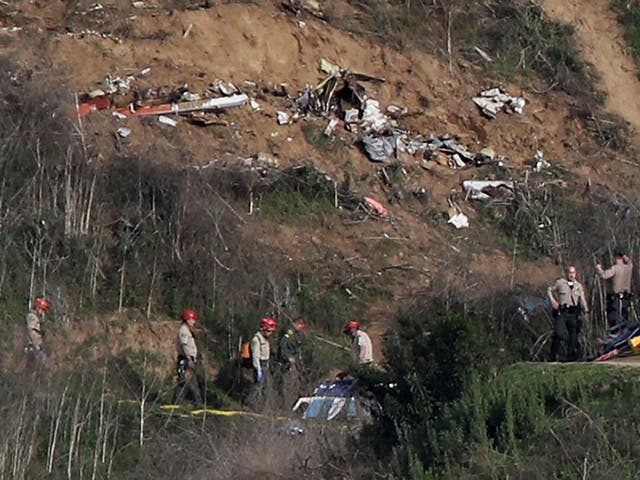Officials are attempting to retrieve the bodies from the helicopter crash that killed Kobe Bryant