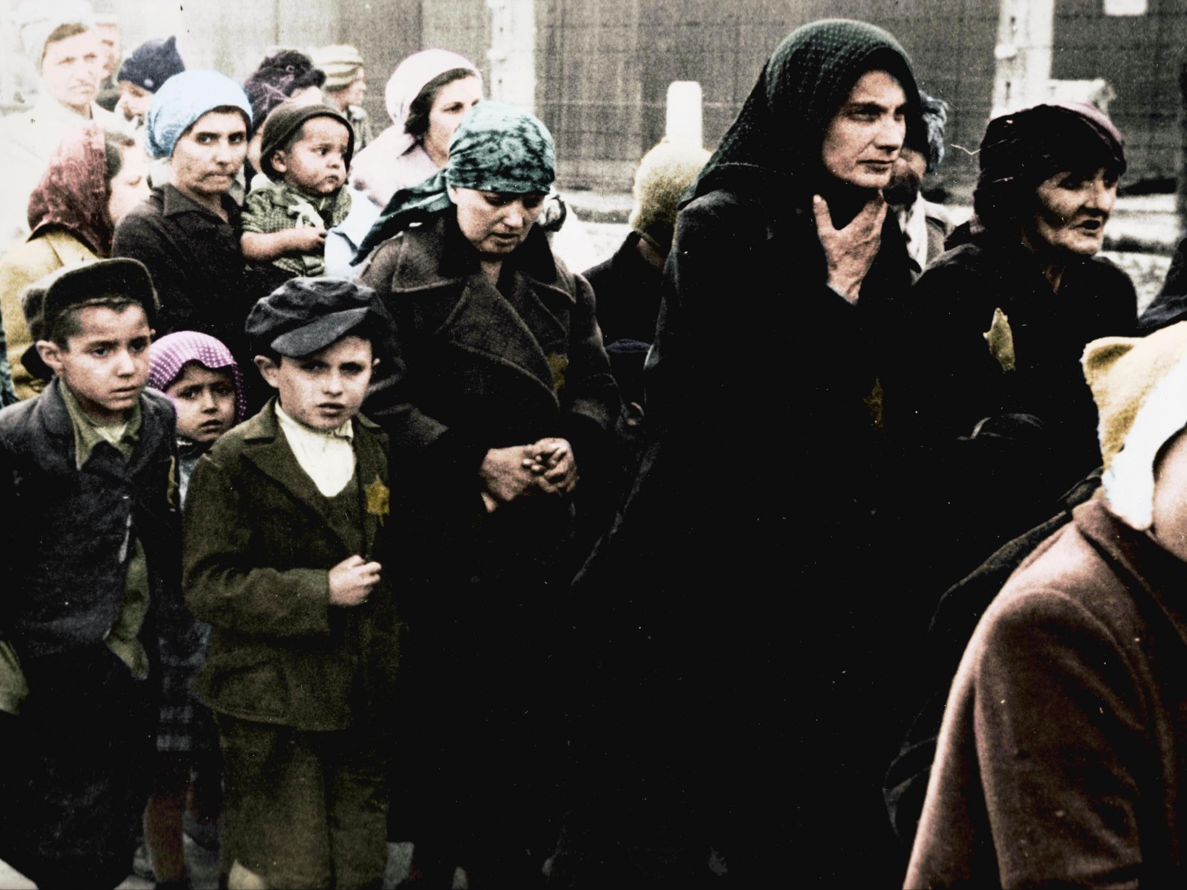 Women and children wearing the Star of David (The Auschwitz Album — Serge Klarsfeld/Lily Jacob-Zelmanovic Meier)