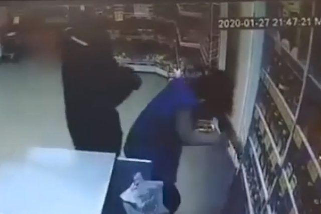 The suspect set fire to a woman in a shop