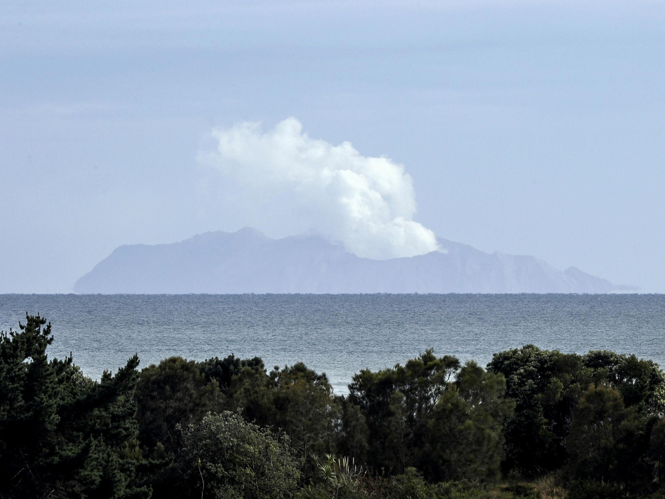 Plumes of steam rose above the volcano on White Island days after the eruption