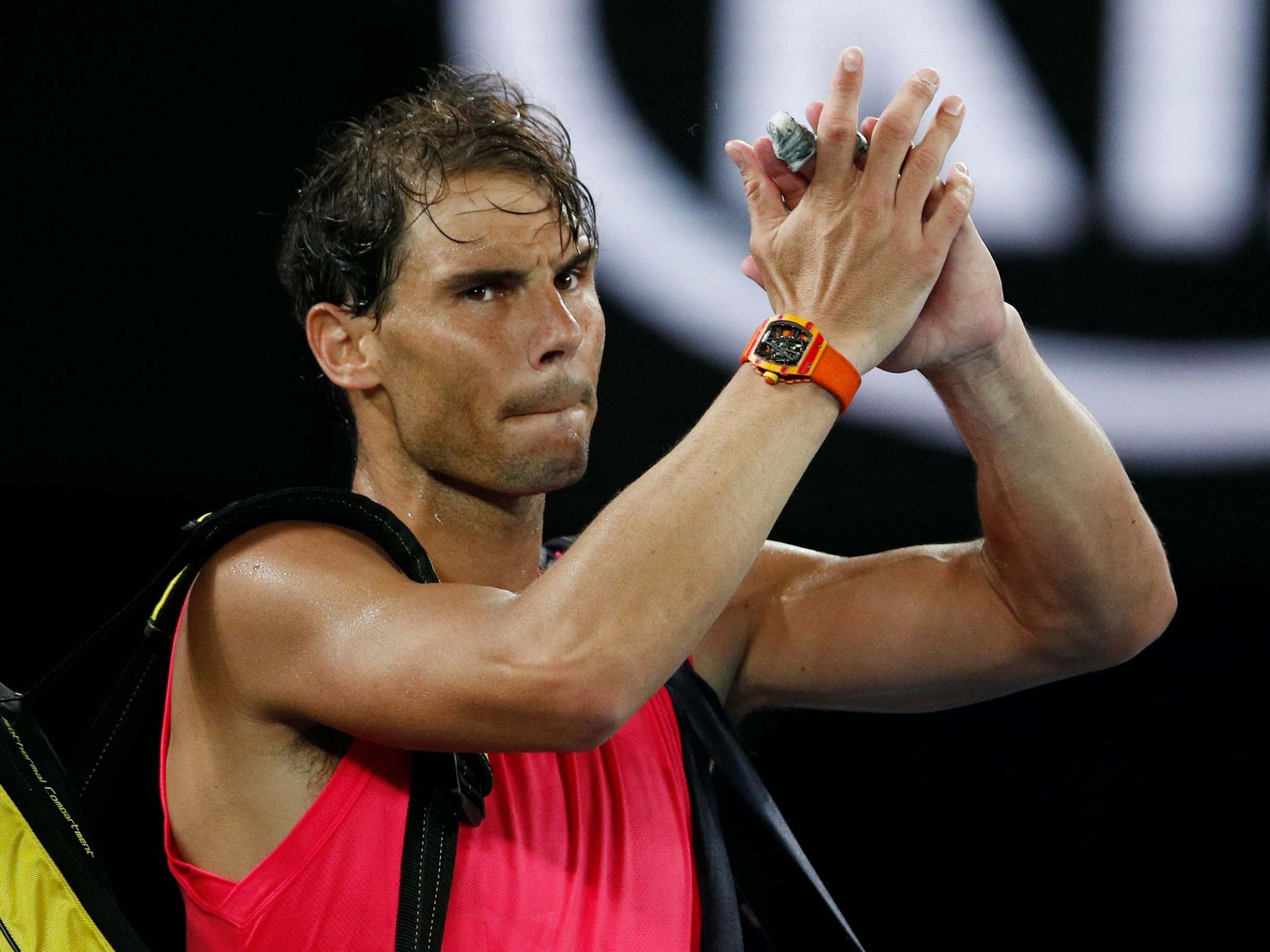 Rafael Nadal reacts after his quarter-final defeat