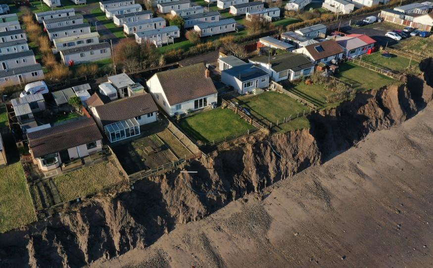 Homes on Skipsea's collapsing coastline