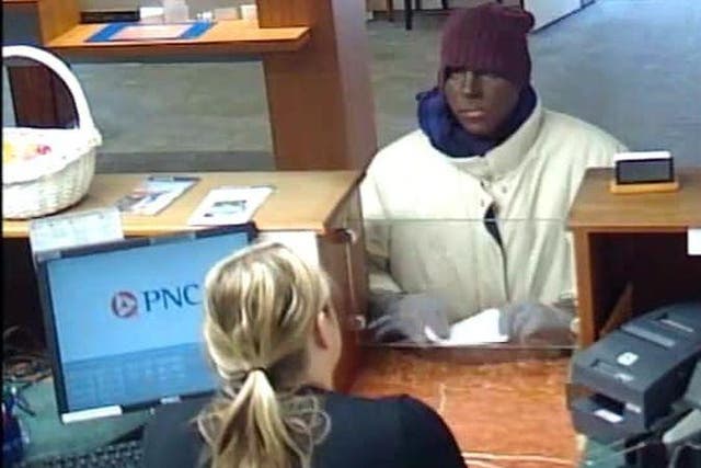 A white man wearing blackface makeup is suspected of robbing a bank in Maryland.
