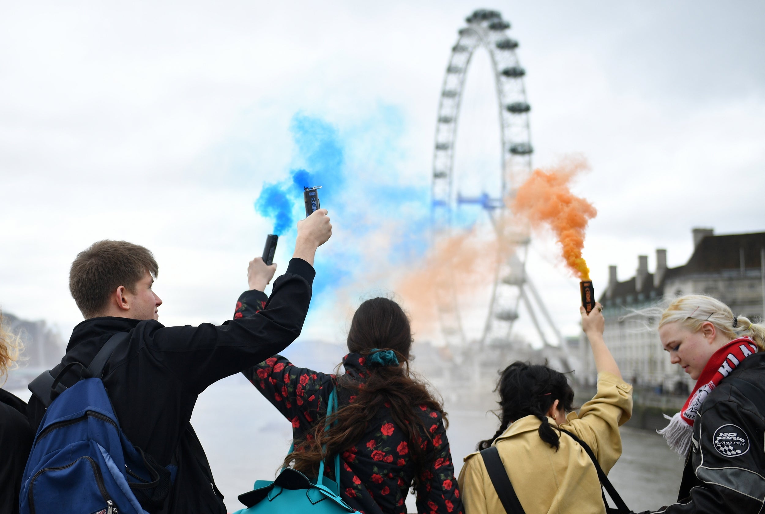Remainers set off flares from Westminster Bridge yesterday