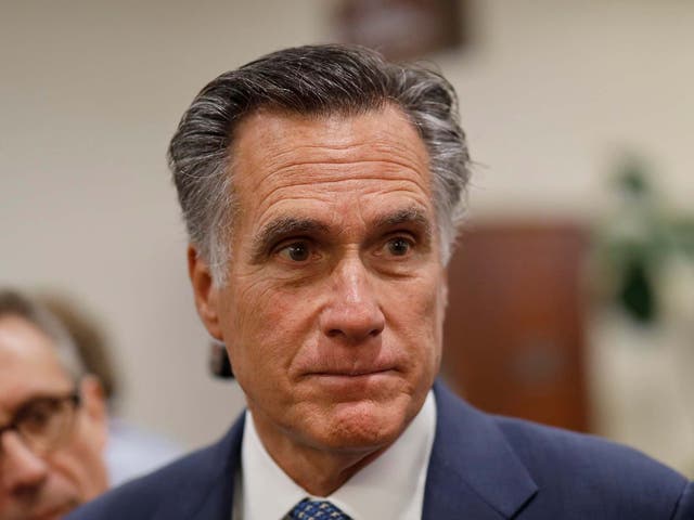 Senator Mitt Romney speaks to reporters during the second week of the impeachment trial of Donald Trump