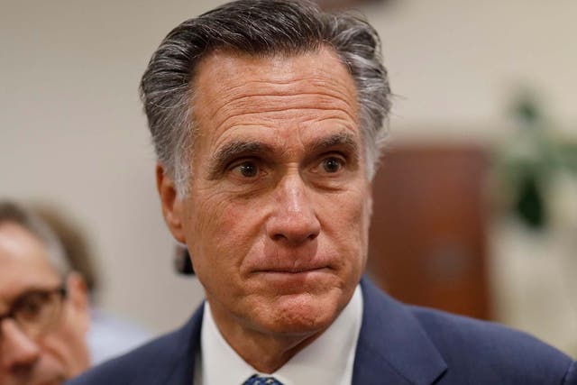 Senator Mitt Romney speaks to reporters during the second week of the impeachment trial of Donald Trump