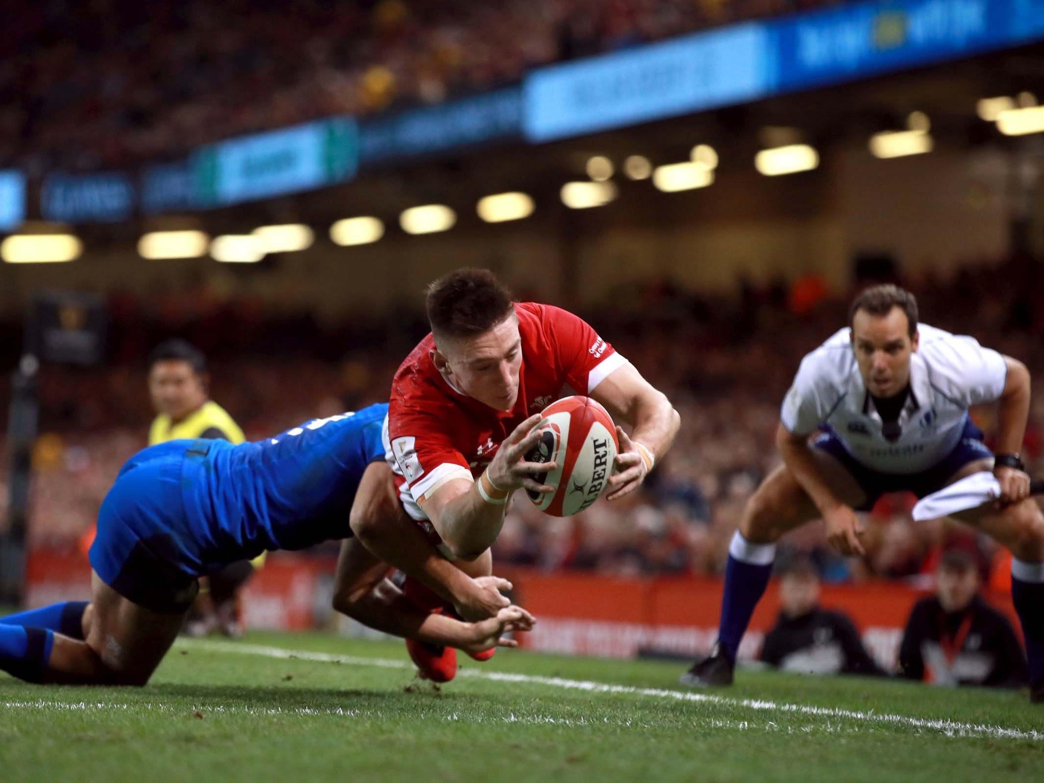 Josh Adams goes over for Wales' second try of the match