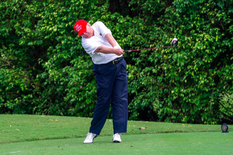 Donald Trump posted a photograph of him teeing off on Saturday morning