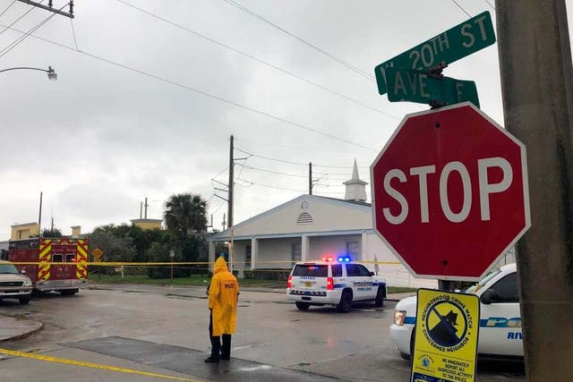 Police at the scene of the shooting outside Victory City Church in Riviera beach