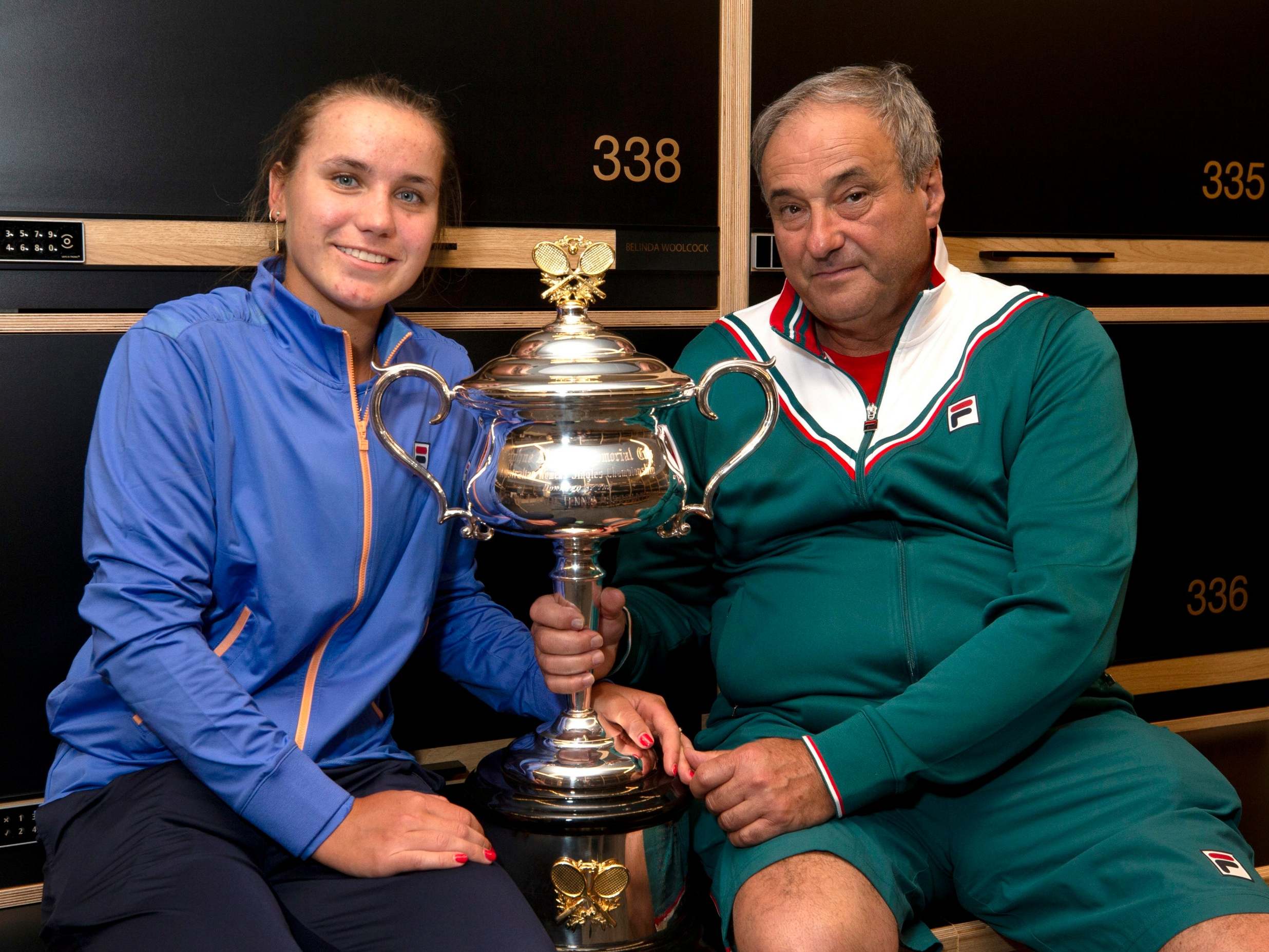 Sofia Kenin celebrates with her father Alexander in the locker room