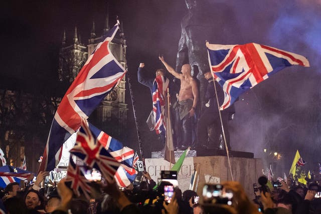 Pro-Brexit supporters celebrate as the United Kingdom exits the EU