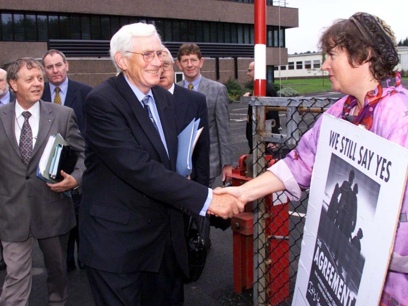 Mallon is welcomed back to the Castle Buildings by a pro-agreement supporter, 1999. He had resigned as deputy first minister when talks broke down