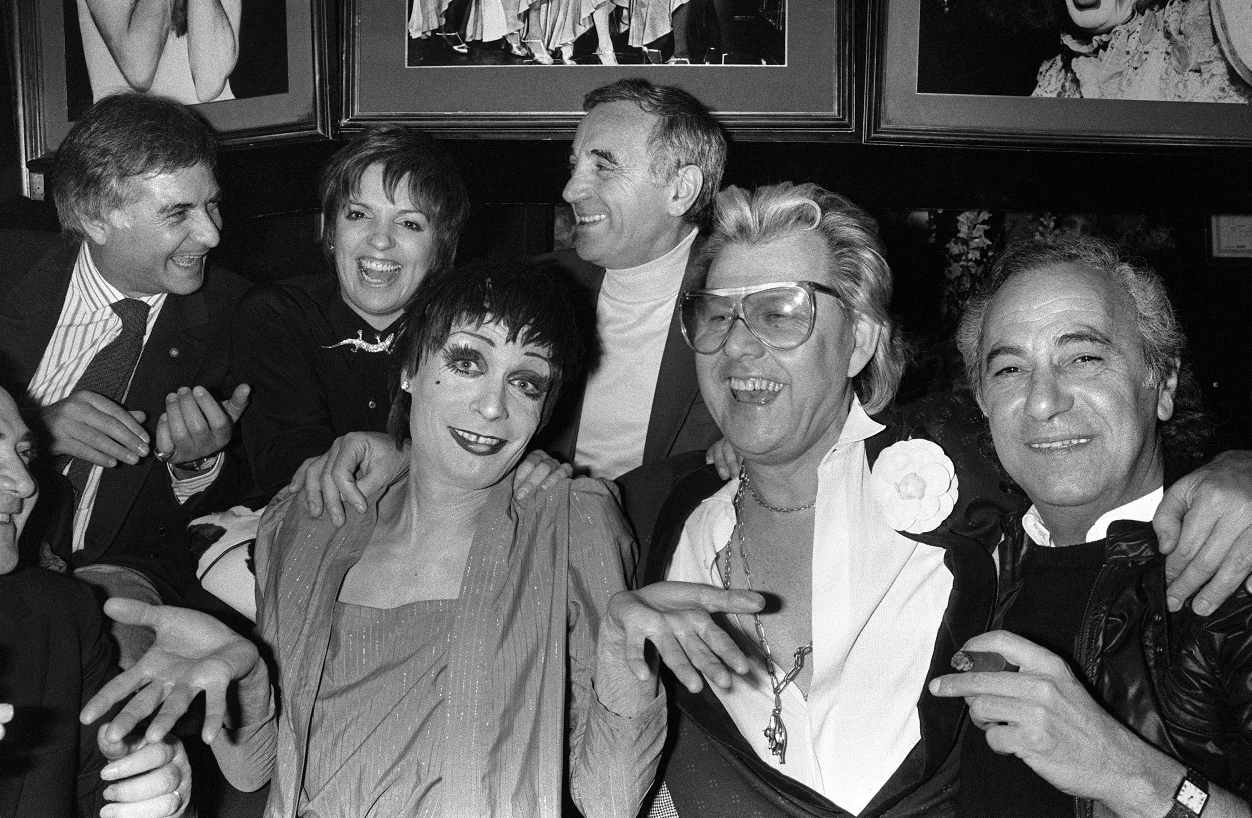 (Top left to right) Jean-Claude Brialy, Liza Minnelli, Charles Aznavour, pose with (front row left to right) impersonator Silvestre, Michou and Georges Garaventz (AFP/Getty)