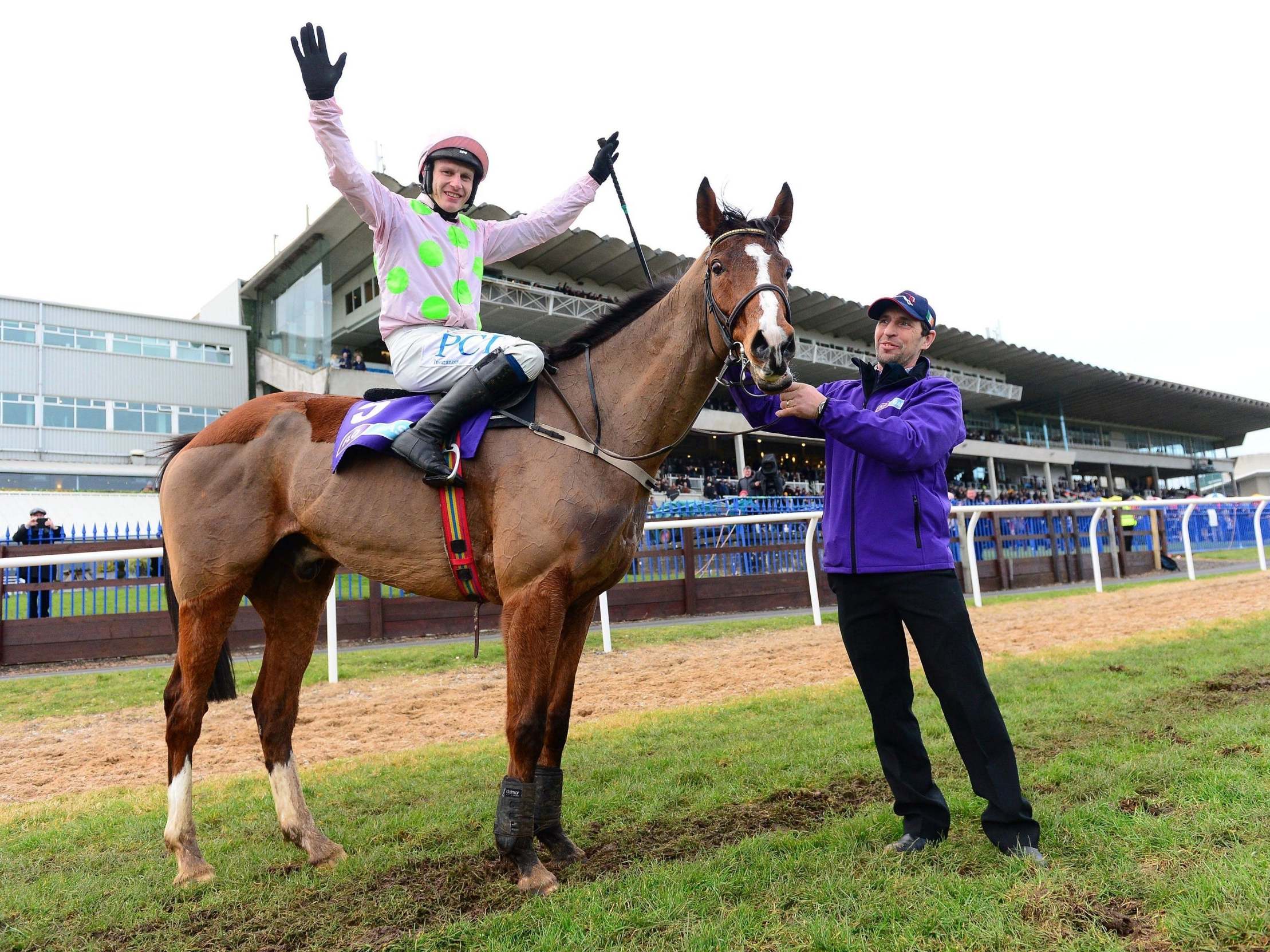 Faugheen and Paul Townend with groom John Codd celebrate after The Flogas Novice Chase