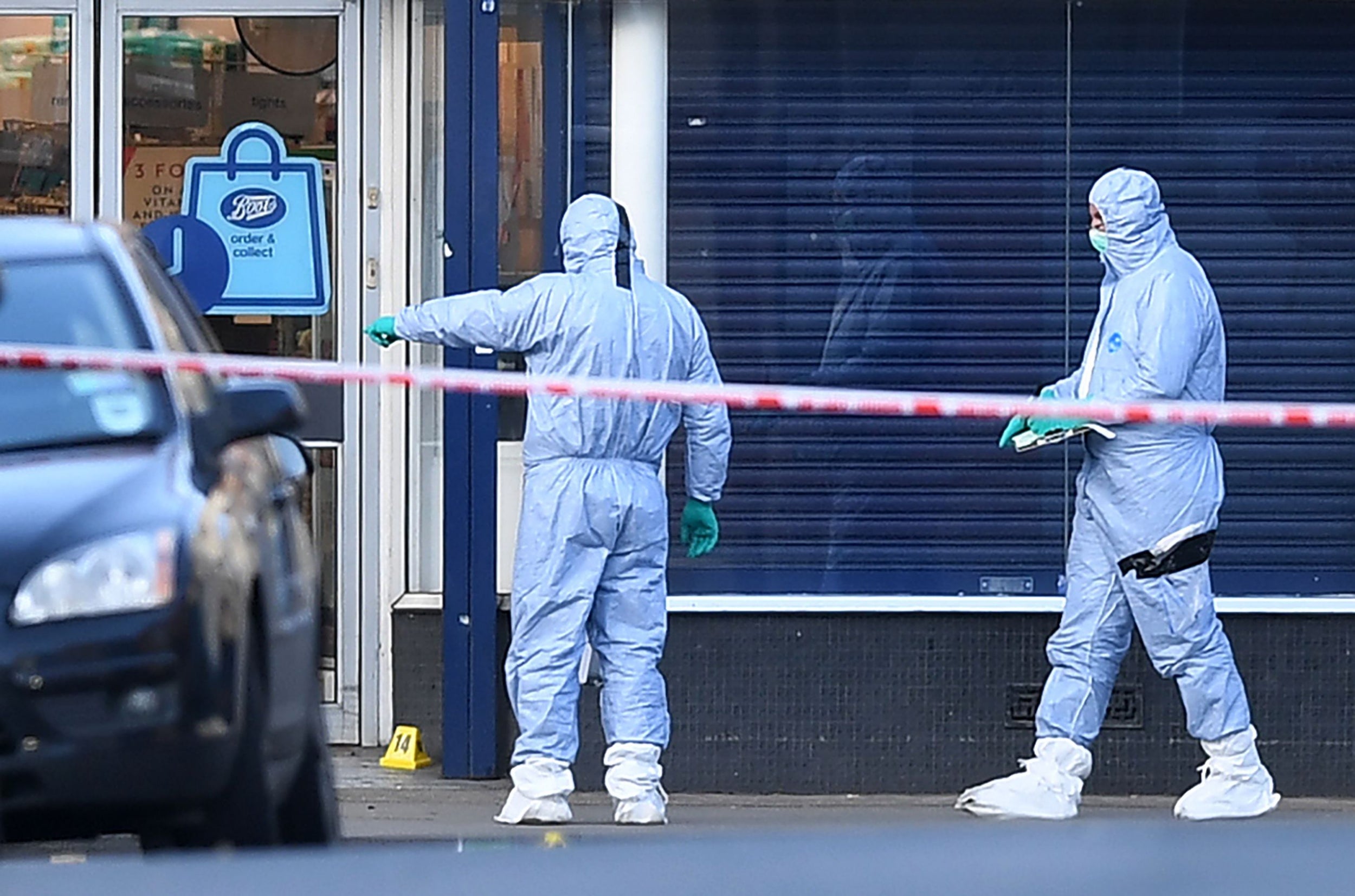Forensic officers at the scene of the attack on Streatham High Road