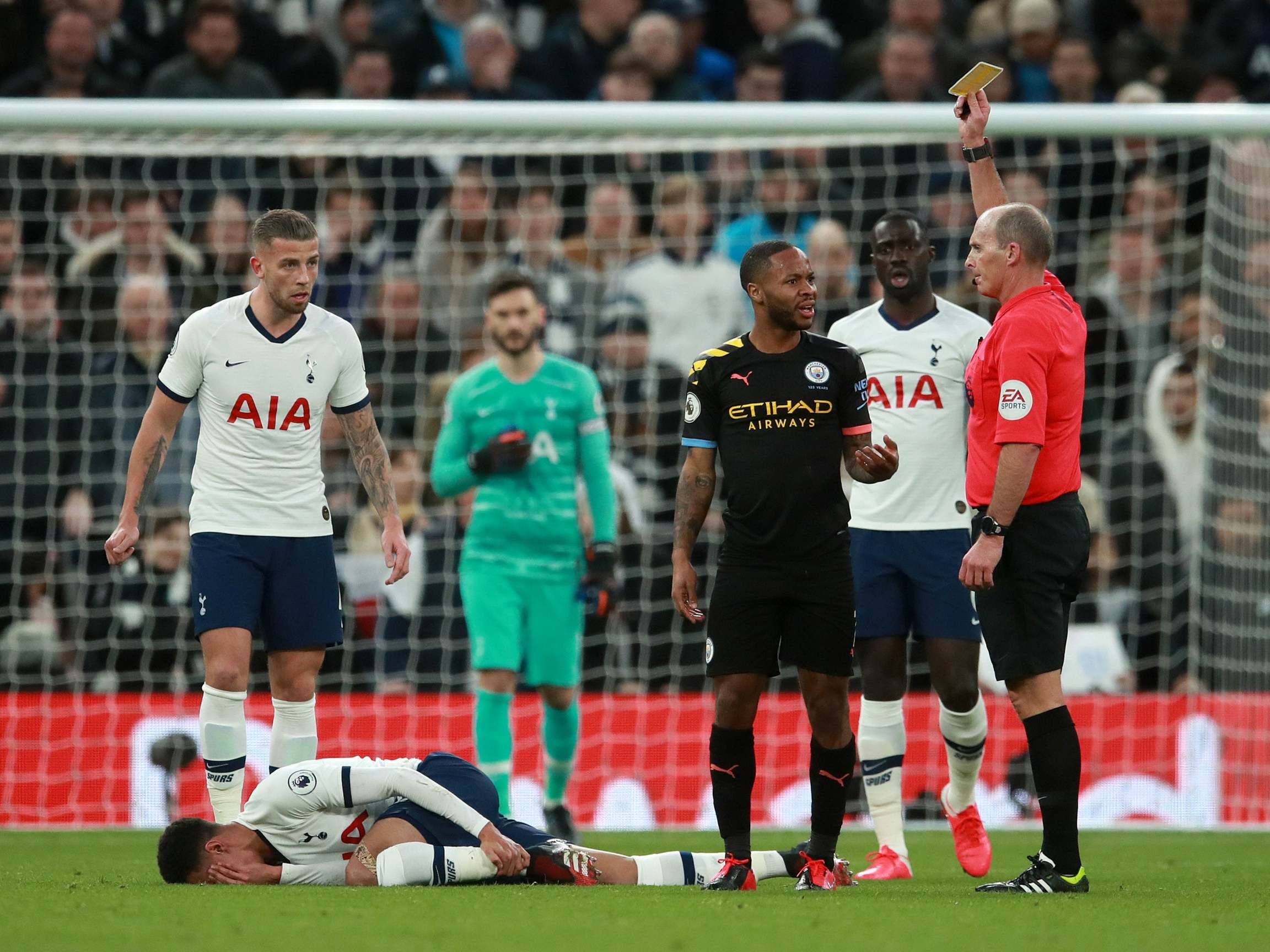 Raheem Sterling escaped a red card for a bad challenge on Dele Alli