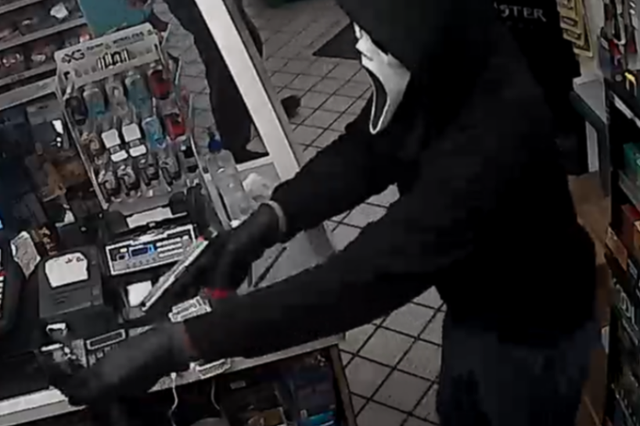 Security footage released by the FBI shows the so-called 'Scream Bandit' holding up a BP Gas Station in Henrico County, Virginia on 5 January, 2020