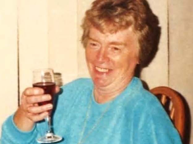 Dorothy Woolmer, 89, was found dead in the bedroom of her home in Tottenham