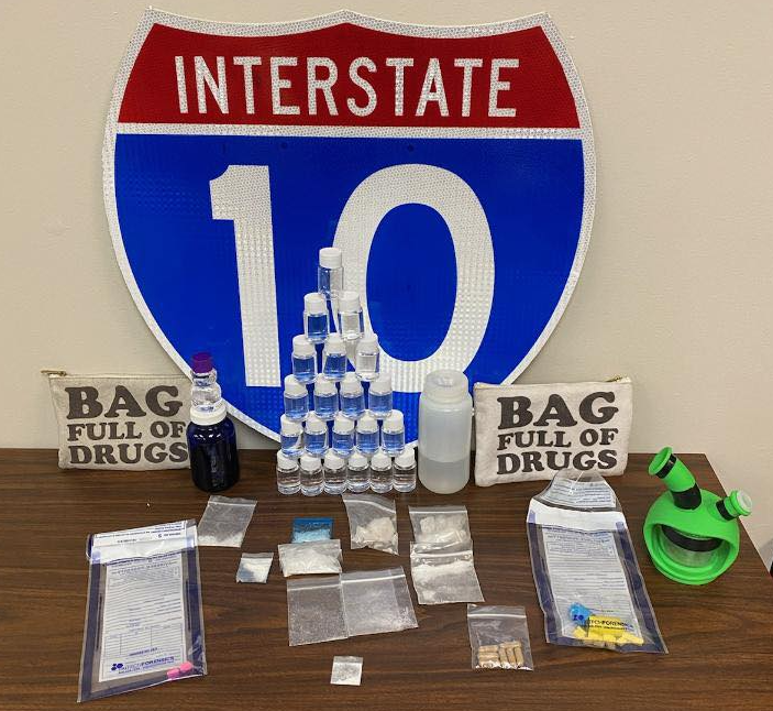 Santa Rosa K-9 Deputies recently assisted Florida Highway Patrol on a traffic stop on I-10 where a large amount of narcotics were discovered in bags labelled 'Bag full of drugs'.