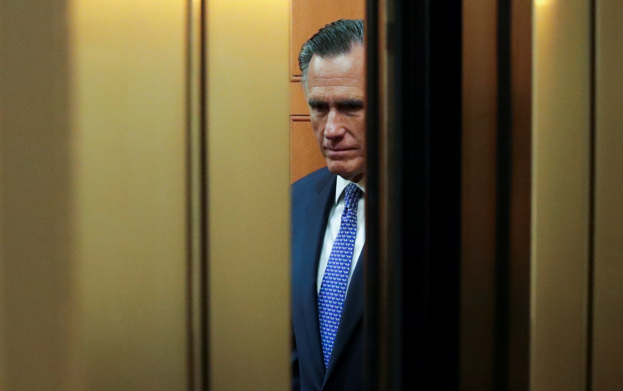Politically explosive Senate investigations run through a very reluctant Mitt Romney