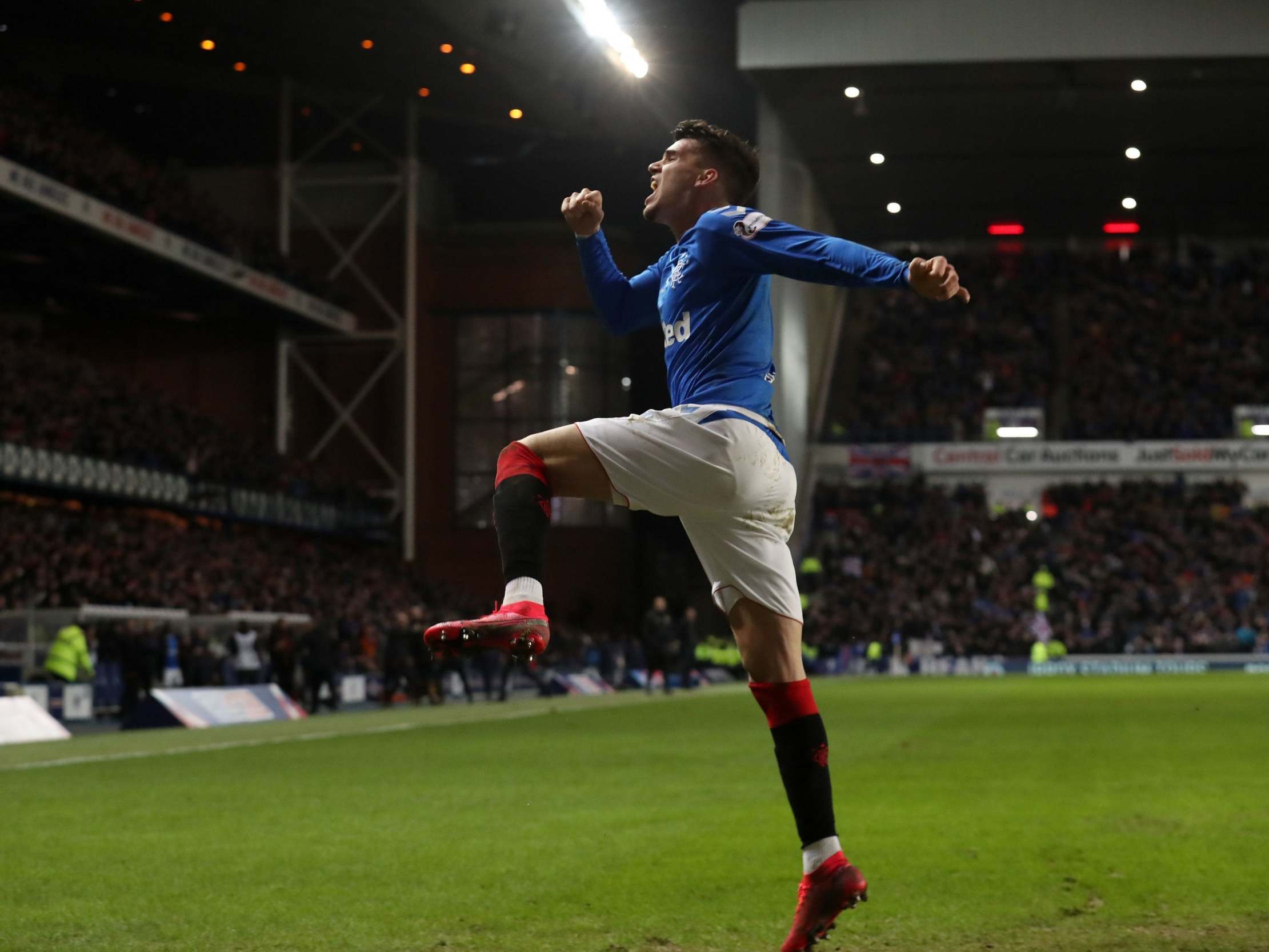 Ianis Hagi celebrates after hitting the winner for Rangers against Hibernian