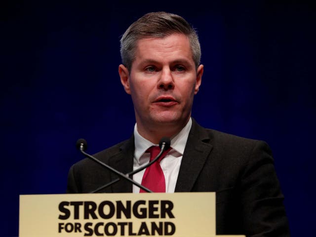 Scotland's Finance Secretary Derek Mackay makes a speech during the SNP autumn conference in 2019