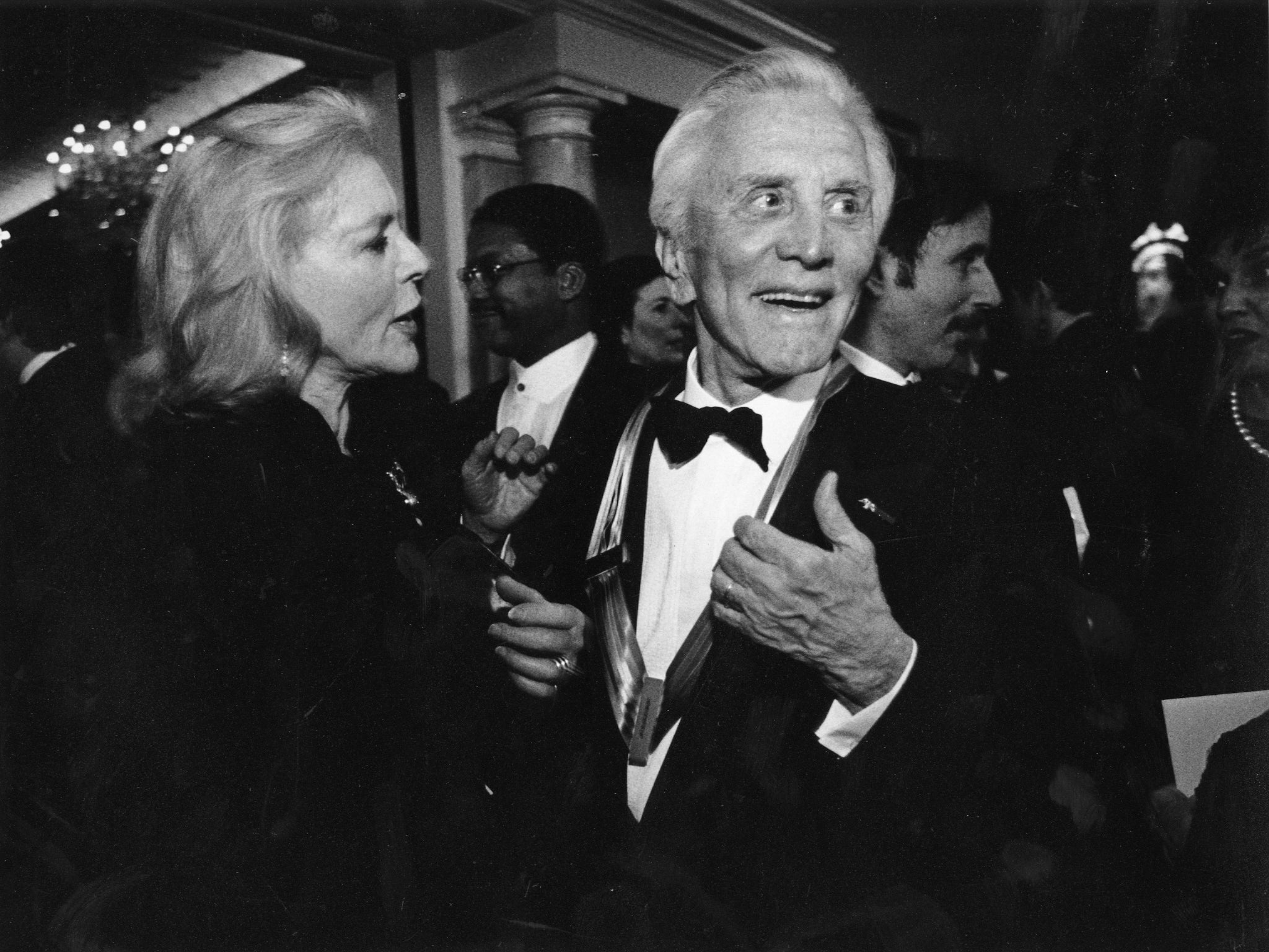 Douglas with Lauren Bacall at a State Department dinner in 1994 (Washington Post/Margaret Thomas)