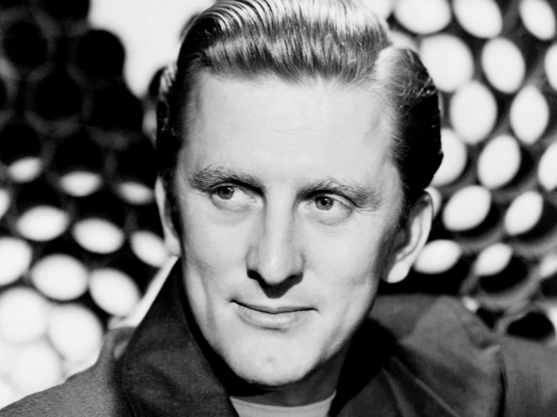 Kirk Douglas pushed his way from an impoverished childhood to become one of the world's biggest movie stars