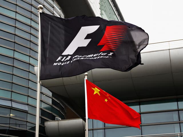 A Formula One flag and the Chinese flag