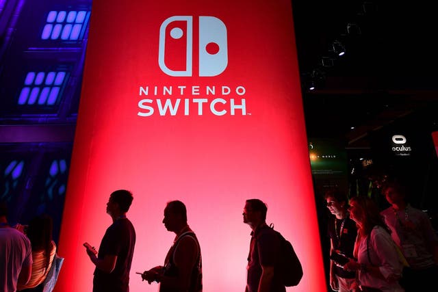 People wait in line for a chance to sample new games for Nintendo Switch at the 2019 Electronic Entertainment Expo, also known as E3, opening in Los Angeles, California on June 11, 2019