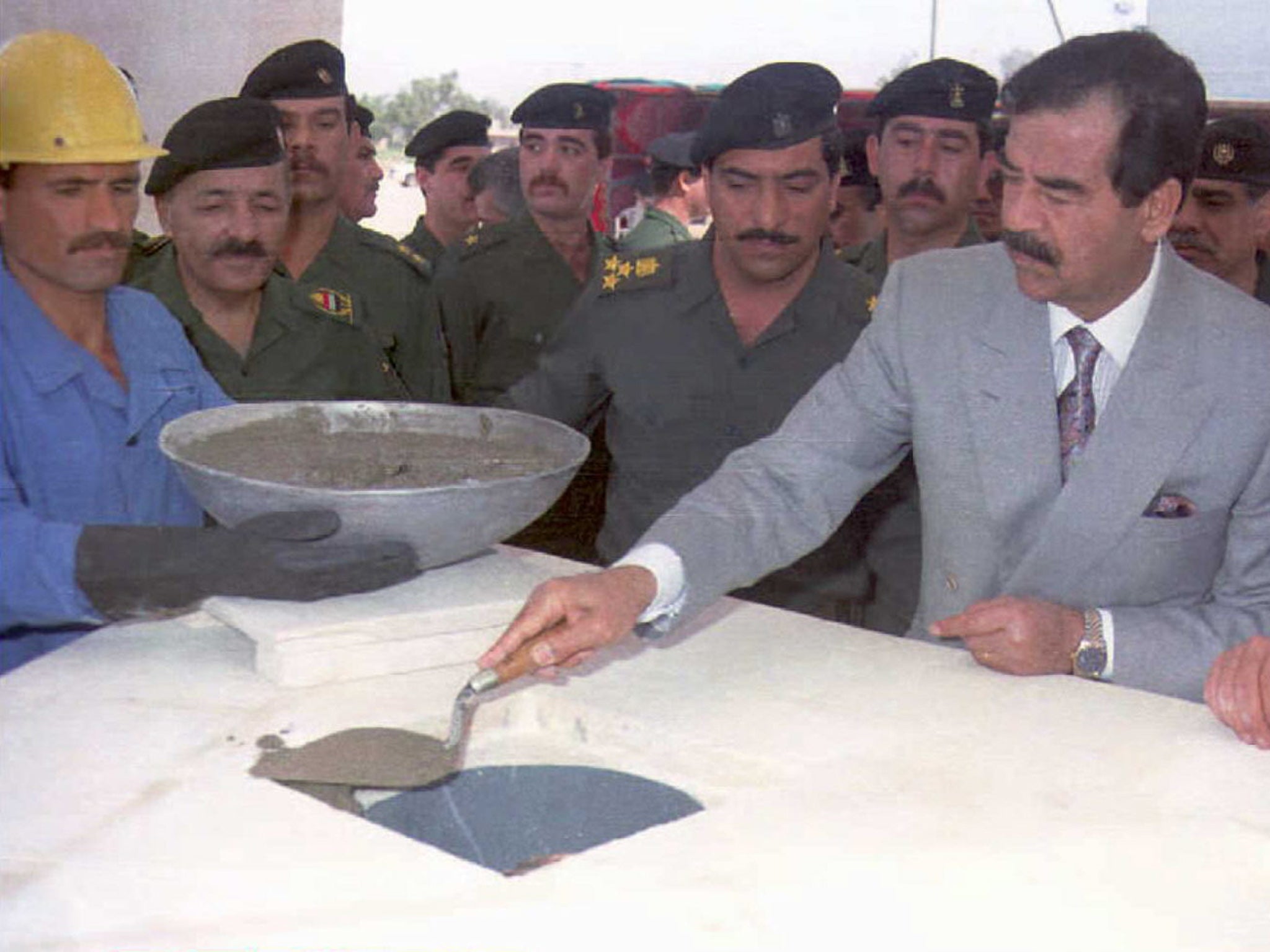 Saddam Hussein lays the foundation stone of the Great Saddam Mosque in 1995