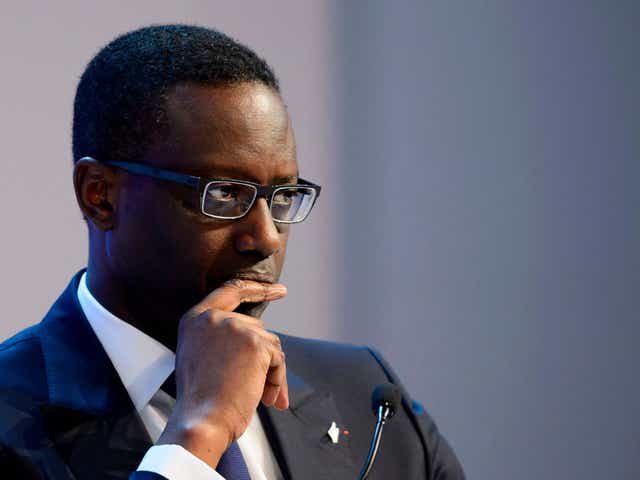 Tidjane Thiam said had not known two of Credit Suisse's former executives had been placed under surveillance