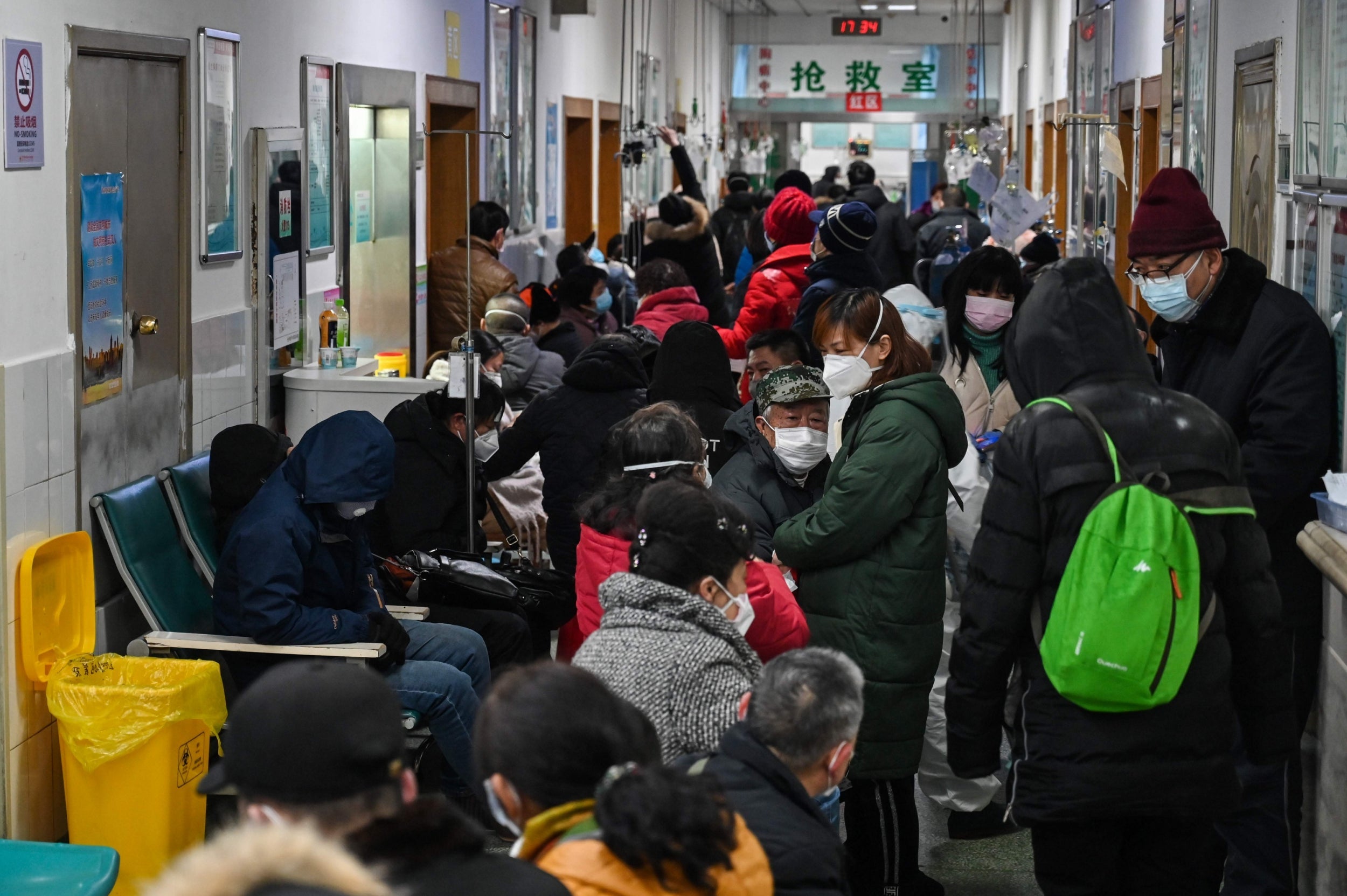 People wait for medical attention at Wuhan Red Cross Hospital