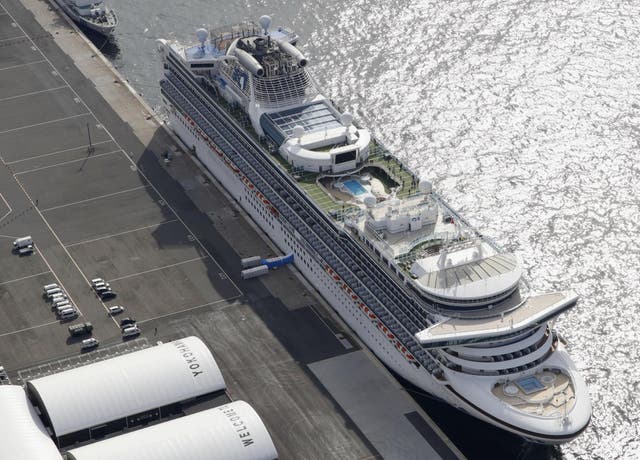 The cruise ship Diamond Princess is docked at Yokohama Port, near Tokyo, Friday, Feb. 7, 2020. Japan on Friday reported 41 new cases of a virus on the cruise ship that's been quarantined. About 3,700 people have been confined aboard the ship.