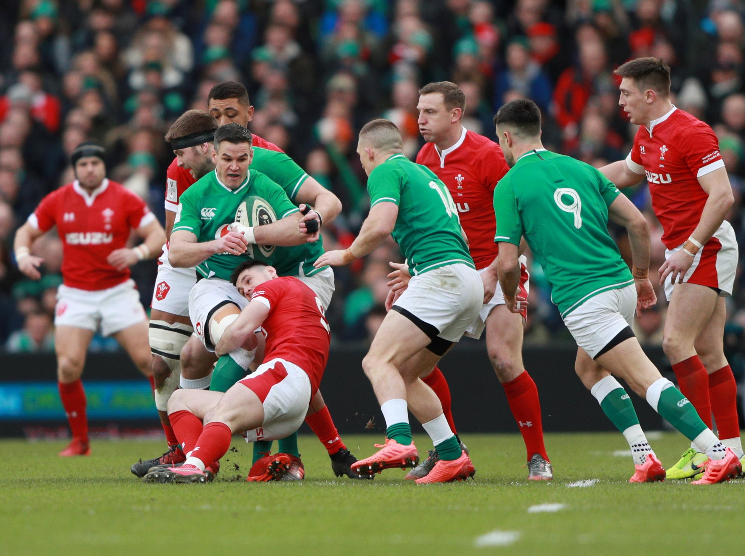 Jonny Sexton is tackled in midfield