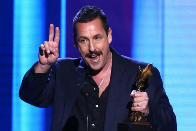 Adam Sandler accepts the Best Male Lead award for 'Uncut Gems' onstage during the 2020 Film Independent Spirit Awards