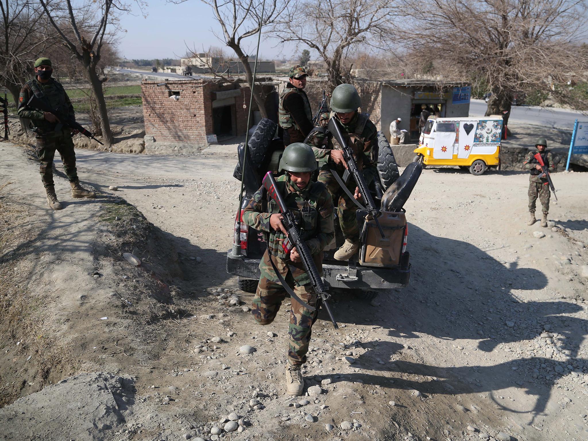 Afghan soldiers patrol in Nangarhar province following the shootout