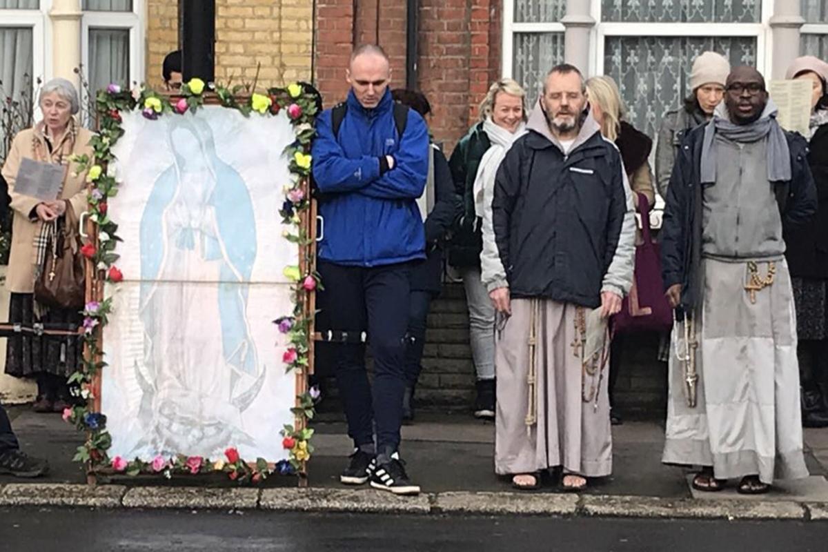 Protesters from Helpers of God’s Precious Infants gather outside the clinic in the capital