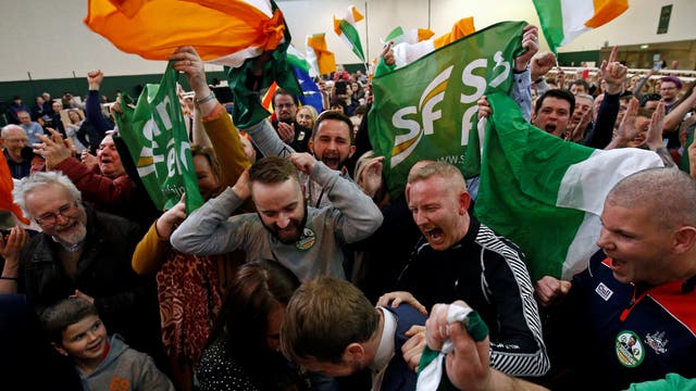 Sinn Fein candidate Donnchadh O'Laoghaire celebrates with supporters