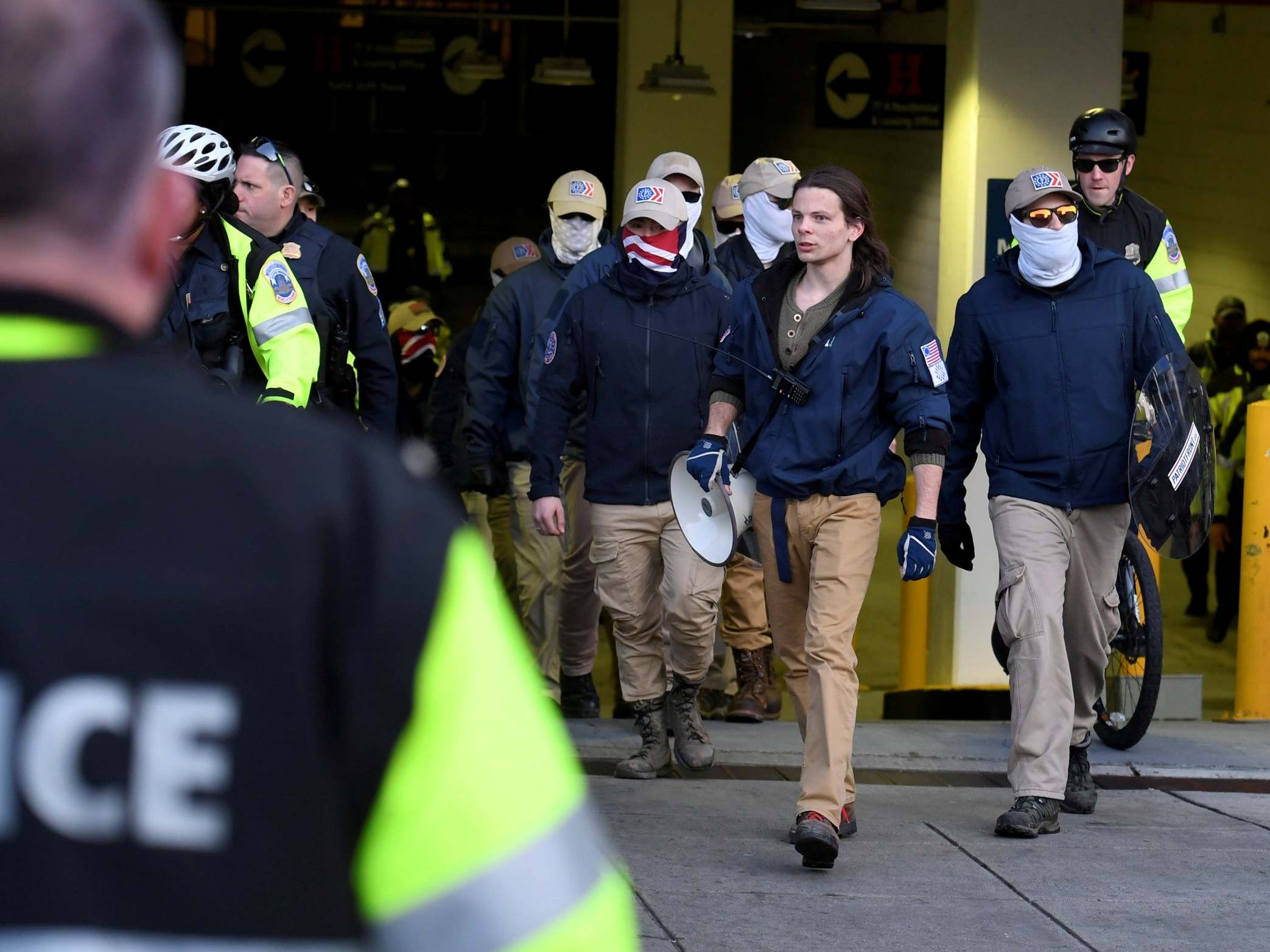 Masked neo-Nazi white supremacists march in Washington DC