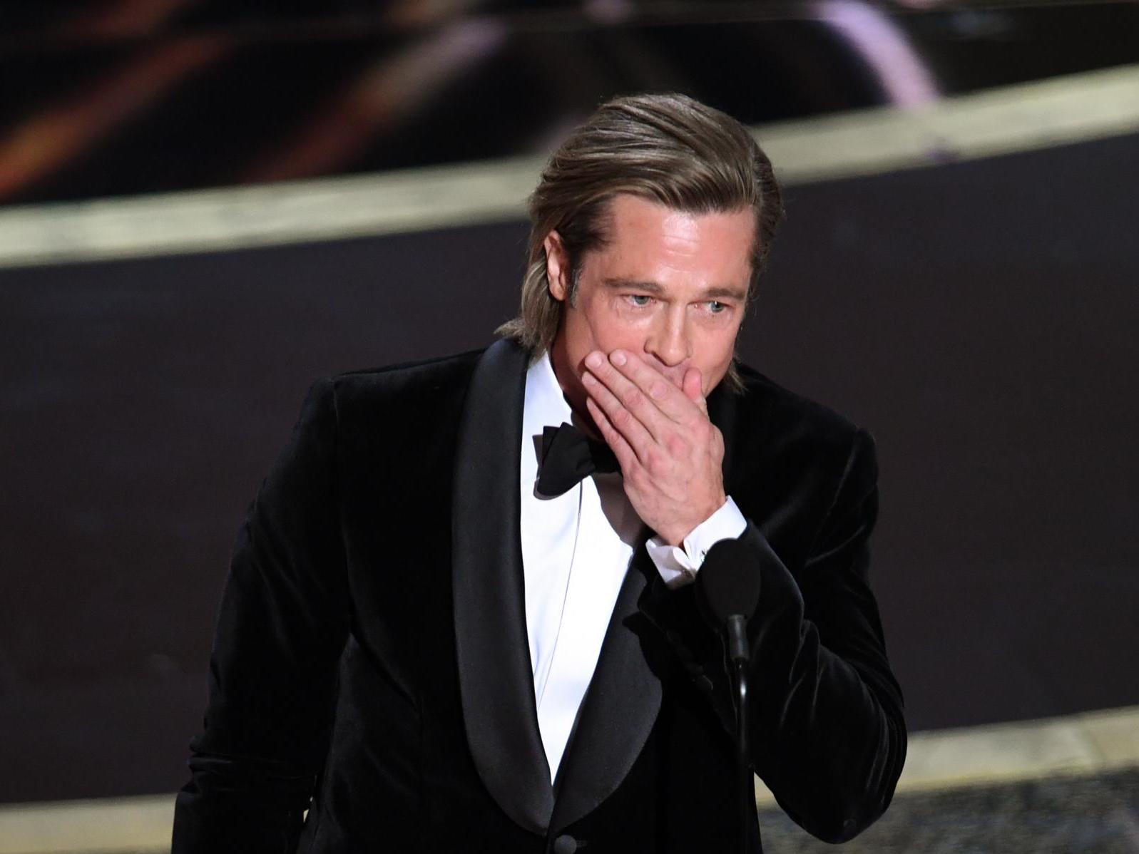Oscars: Brad Pitt hilariously recoils from Janelle Monae&apos;s microphone in opening performance